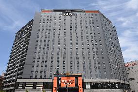 Exterior, logo, and signage of APA Hotel & Resort Niigata Ekimae Odori